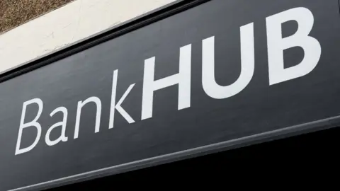 A sign reading bank hub