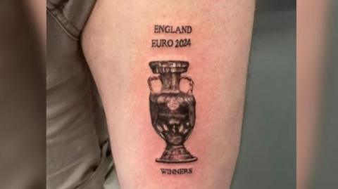 Dan Thomas' tattoo of Euro Winners on his left leg