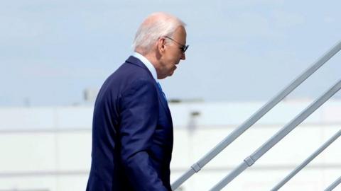 Joe Biden boards a flight to Las Vegas on Wednesday