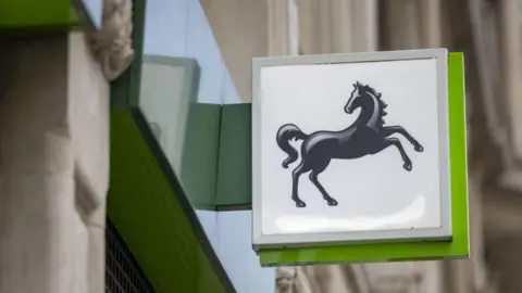 A Lloyd's Banking Group sign featuring the company's logo