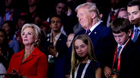 Donald Trump stands with family members at the Republican convention 