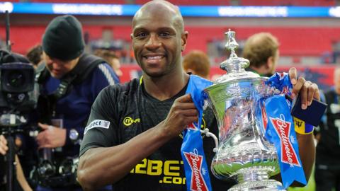 Emmerson Boyce celebrates winning the FA Cup with Wigan