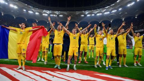 Romania celebrate qualifying for Euro 2024