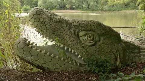 A dinosaur sculpture in Crystal Palace Park