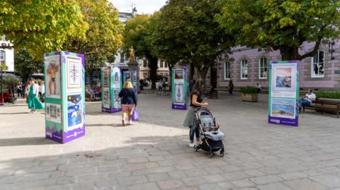 Display stands in Jersey's Royal Square host previous photograph competition winners