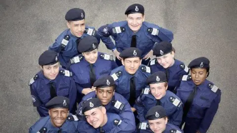 Met Police A group of cadets looking up at camera