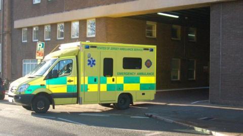 A States of Jersey ambulance coming out a building