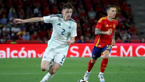 Conor Bradley on the ball against Spain