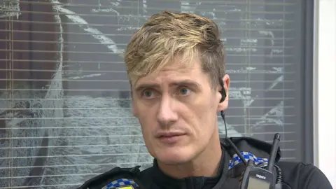 PC Maverick Reddington was stabbed under his armpit and describes the incident as "absolute bedlam".
