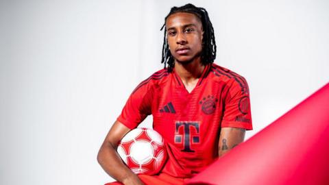 Michael Olise in a Bayern Munich shirt