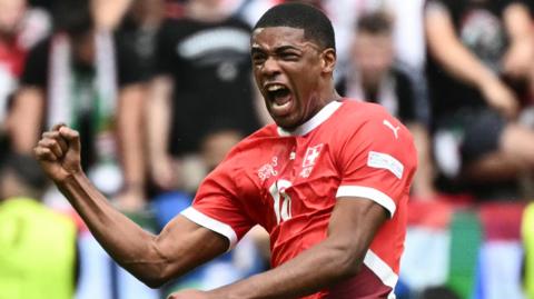 Kwadwo Duah celebrates scoring the opening goal in Switzerland’s Group A victory over Hungary at Euro 2024