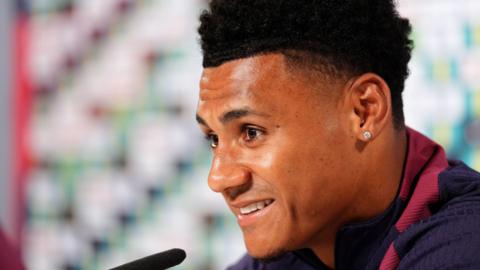 Close-up of Ollie Watkins at a press conference