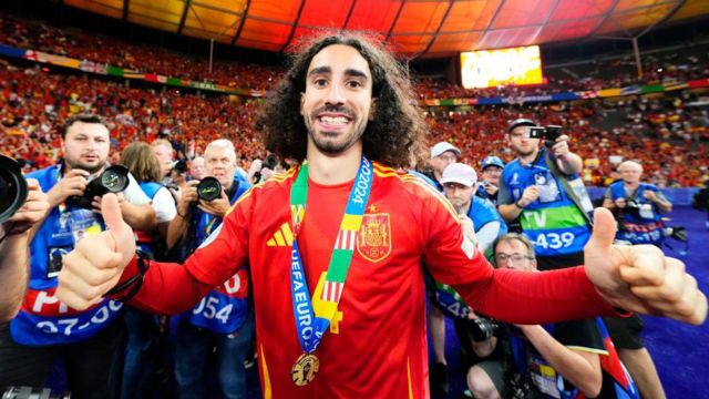 Marc Cucurella of Spain and Chelsea celebrates after winning Euro 2024