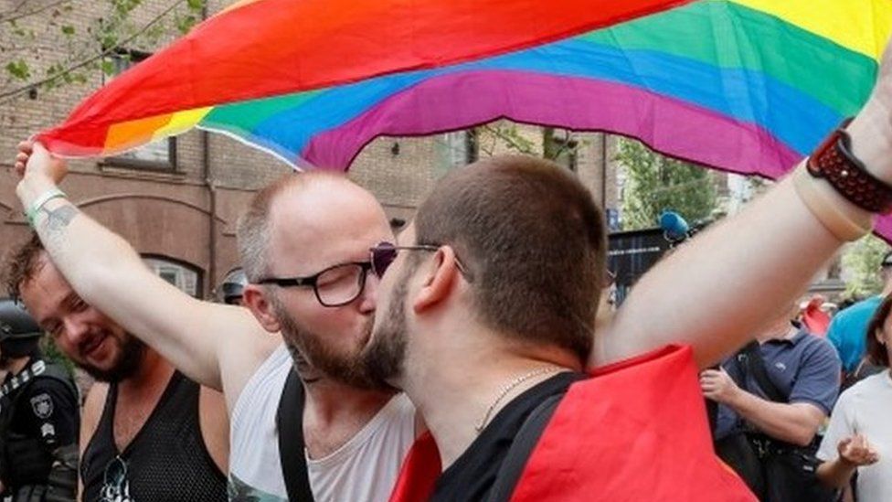 A couple kiss at Kiev Pride