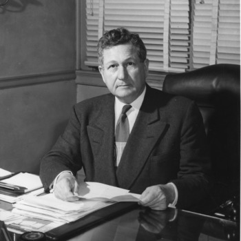 Chancellor John W. Harrelson at desk