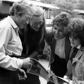 Katharine Stinson with three students