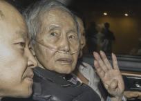 El expresidente peruano Alberto Fujimori y sus hijos Kenji y Keiko Fujimori.