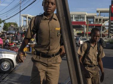 NYT: Students walk early morning to school in Spanish Town, September 21, 2023. Alejandro Cegarra for The New York Times