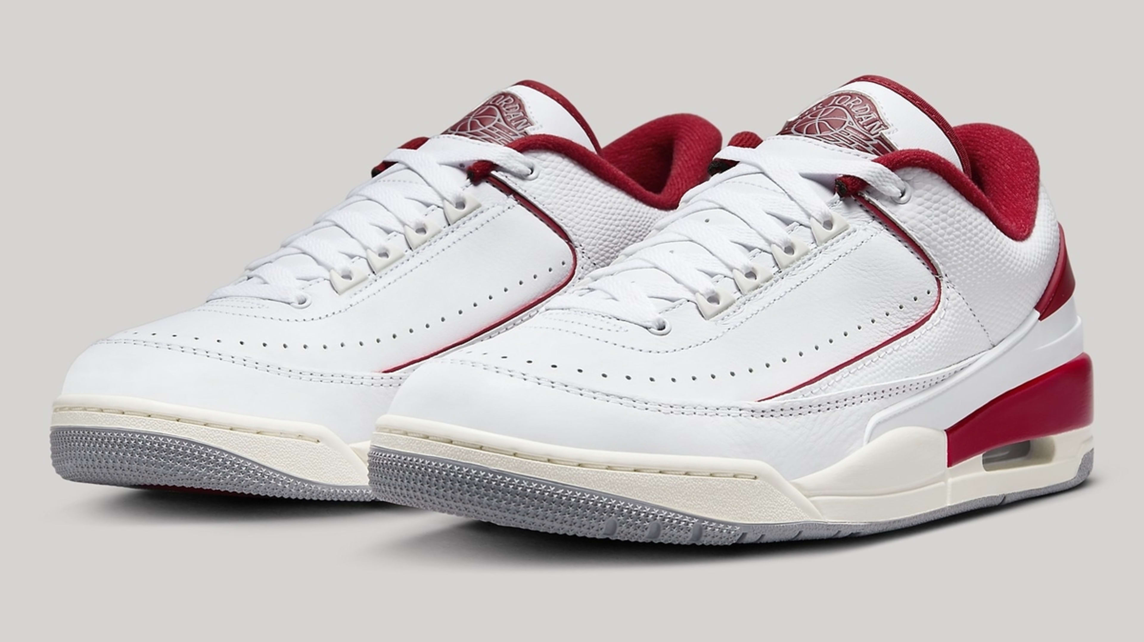 A pair of Air Jordan 3 sneakers with white and red detailing