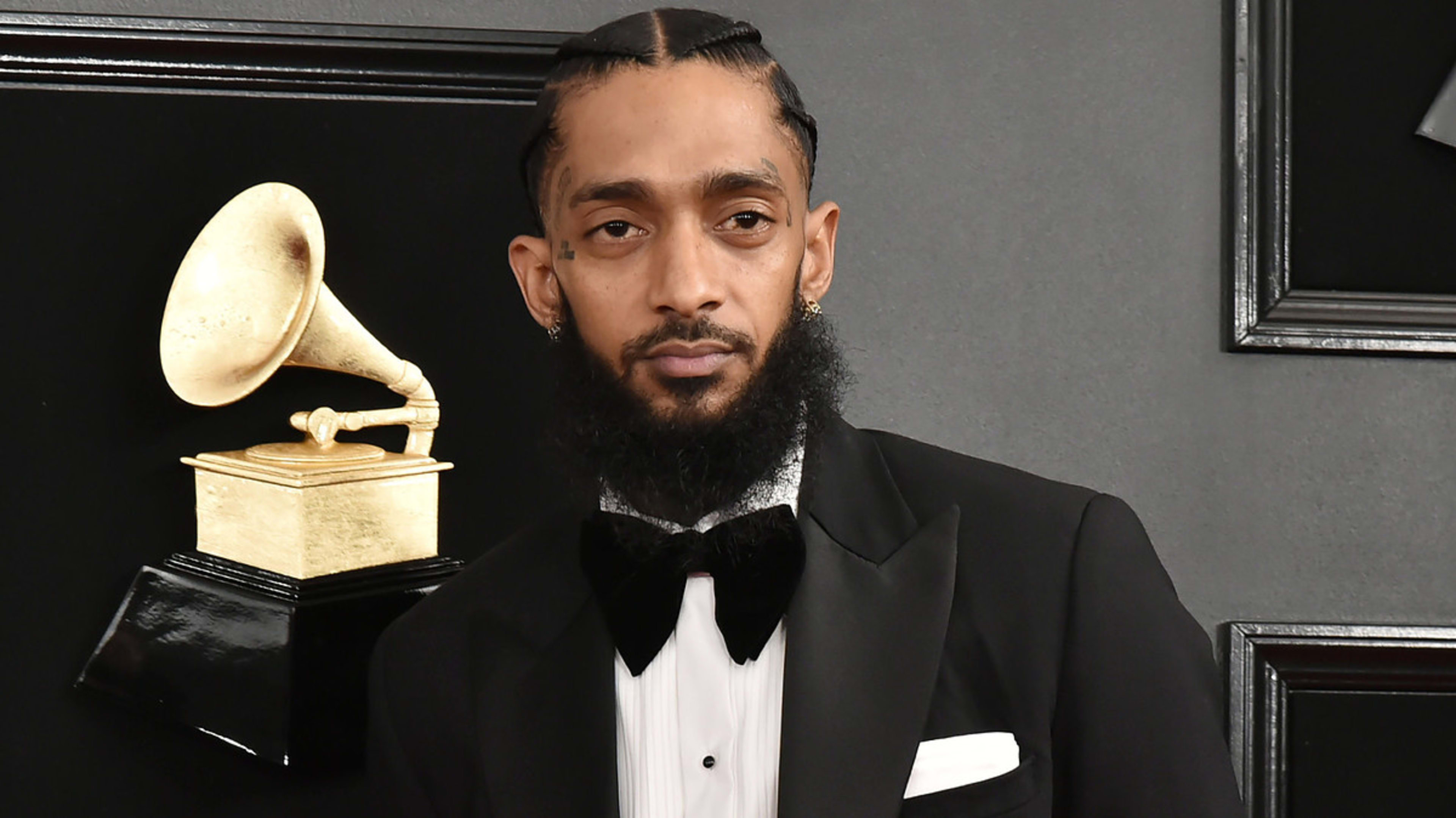 Nipsey Hussle is seen at a Grammys event