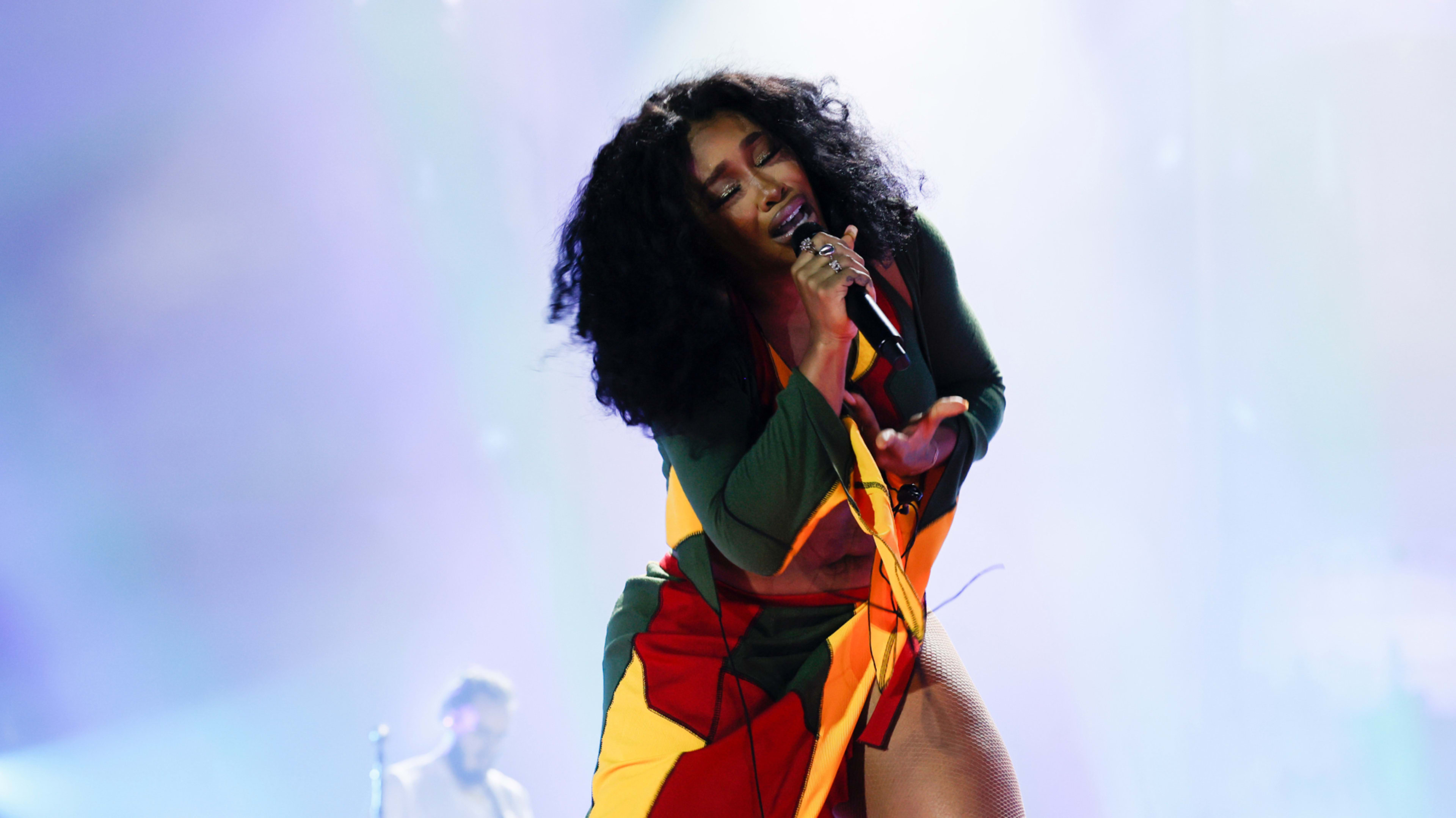 SZA is seen performing live