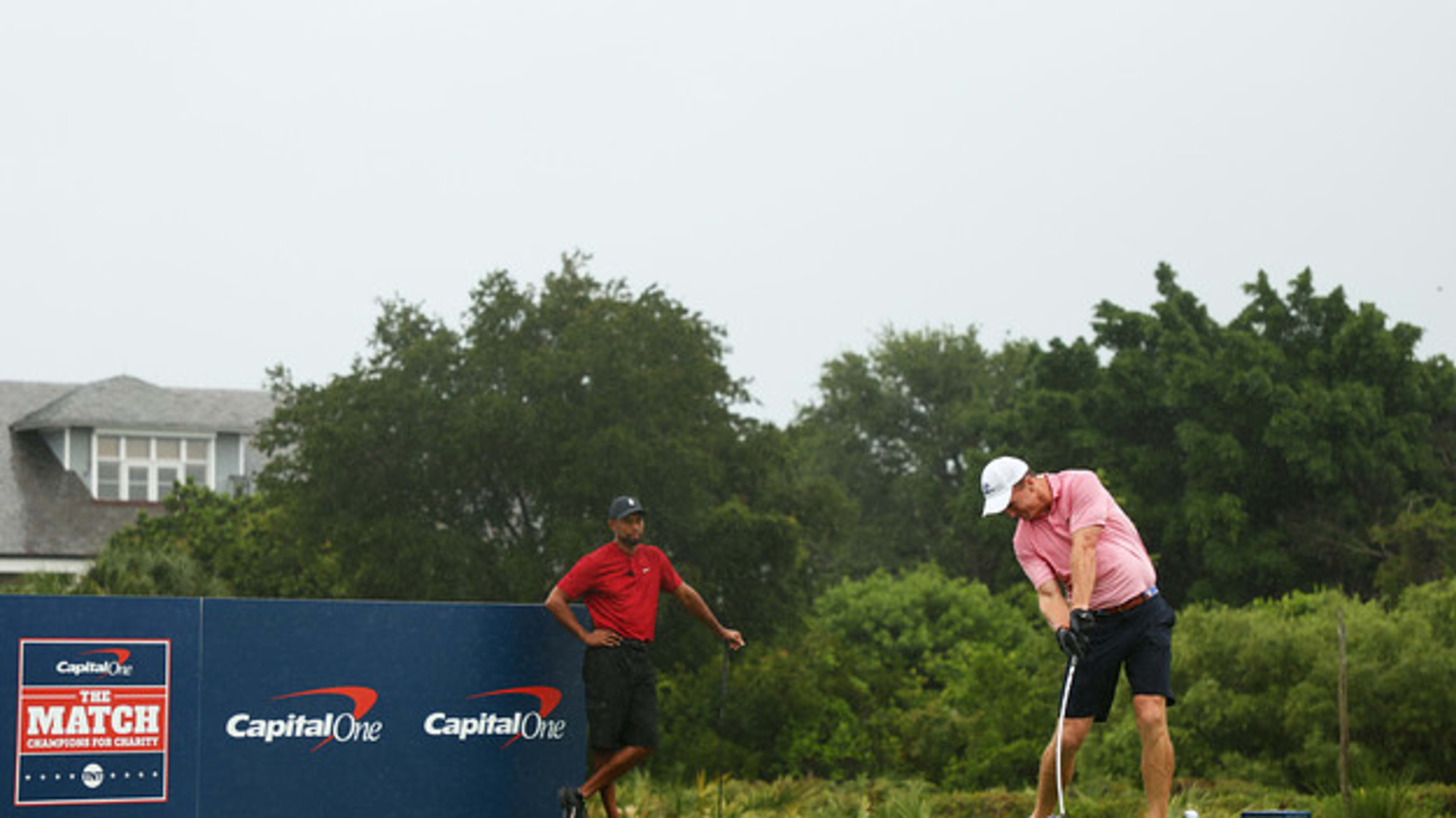 Peyton Manning/Tiger Woods