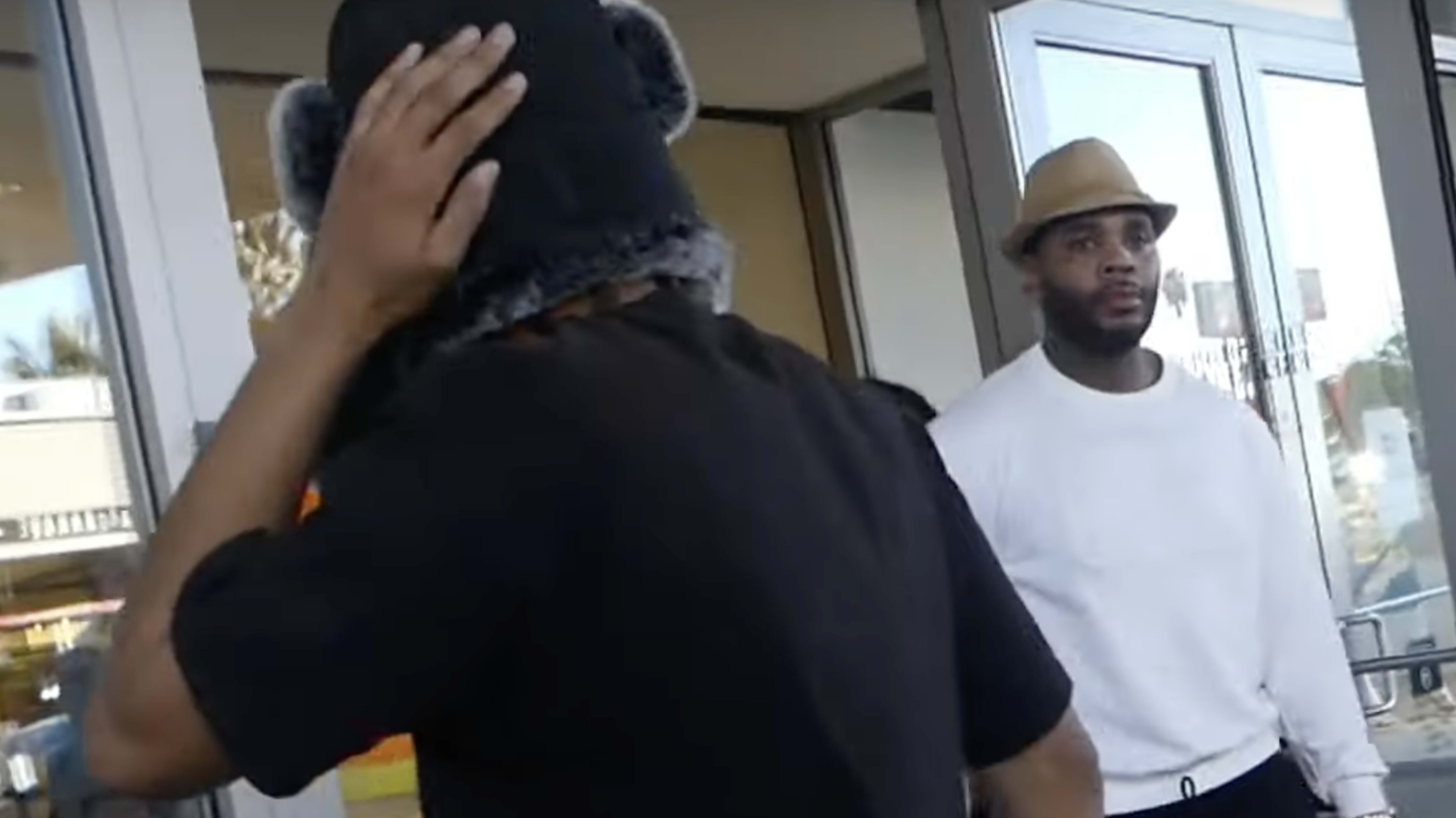 Still image of Kevin Gates coming out of a door taken from video. 