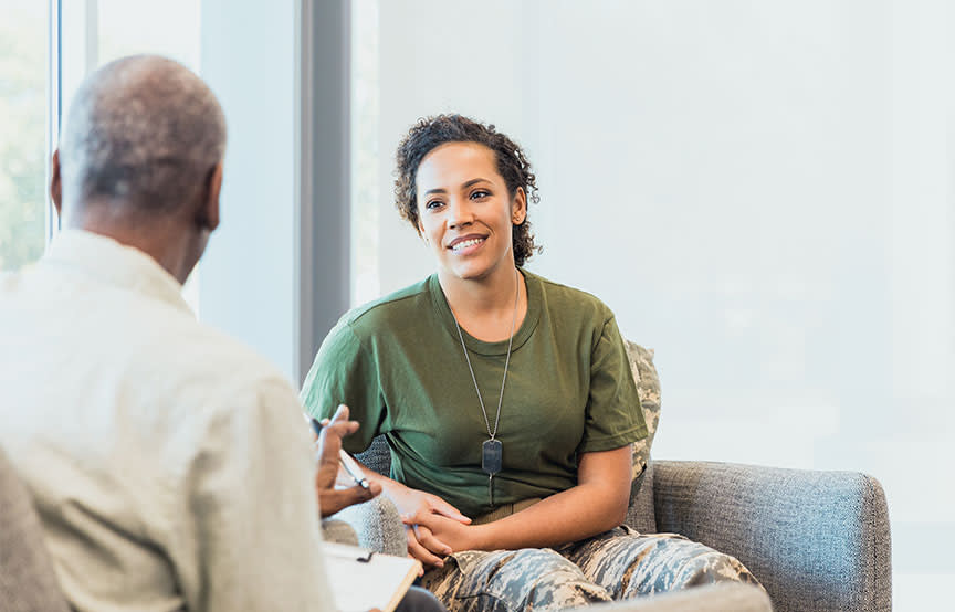 army woman talking to a doctor