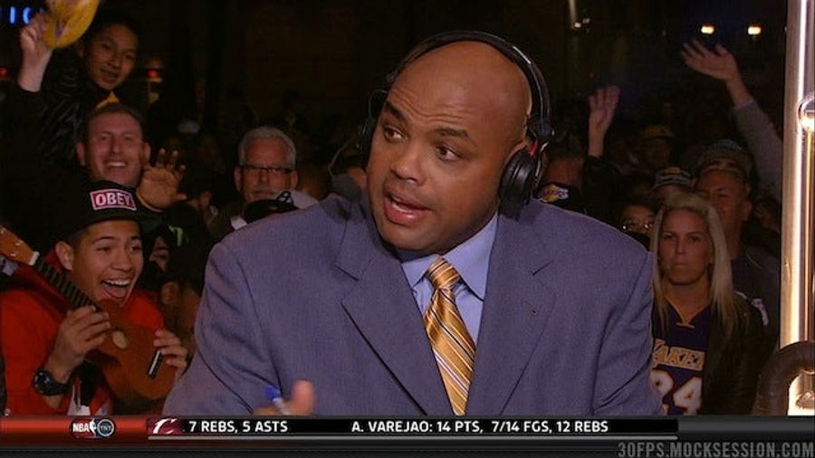 This Fan Behind Charles Barkley Is Awfully Excited To Be Holding A Ukulele