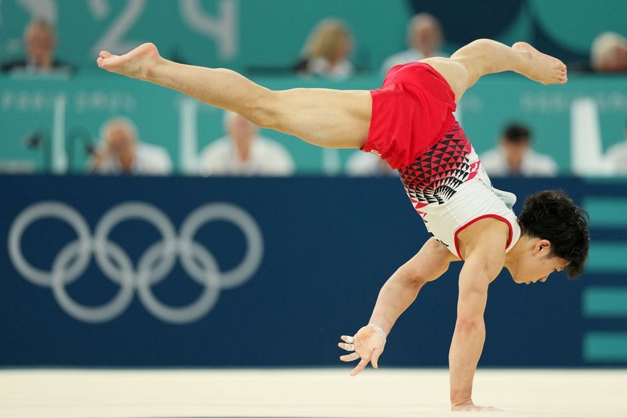 Japan's Shinnosuke Oka wins gold in tense gymnastics all-around