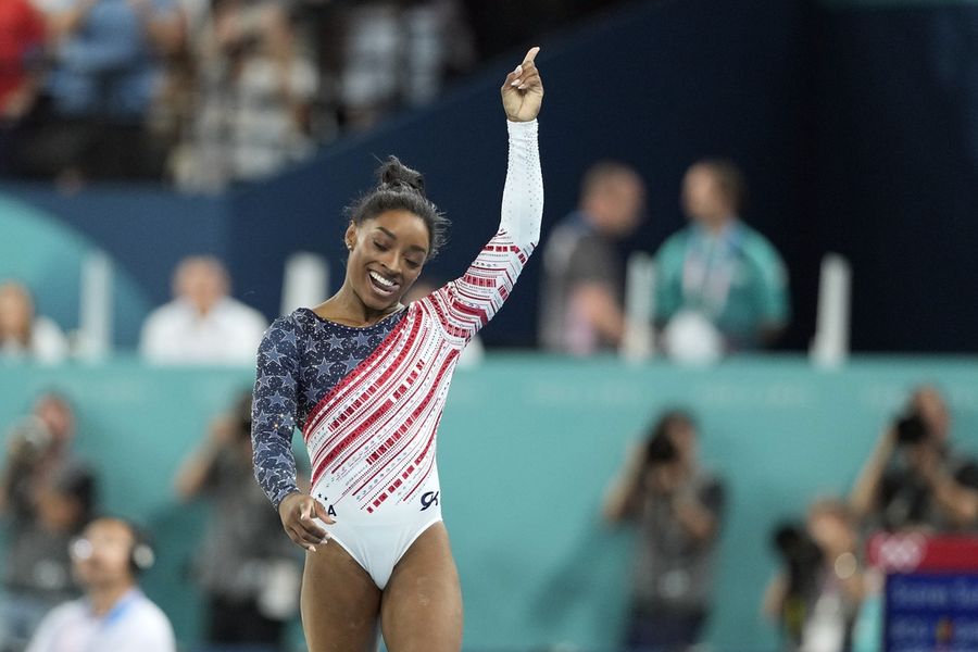 Simone Biles sparkles to take gold, Suni Lee bronze in all-around