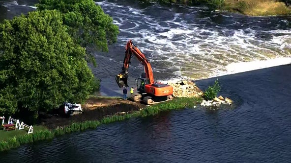 Faribault dam damaged by flooding, crews work to ease erosion