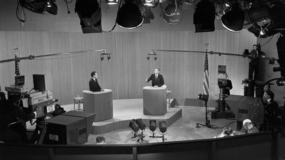 Then-Vice President Richard Nixon and then-Senator John F. Kennedy engage in a televised debate during the lead-up to the 1960 presidential election. (Getty)