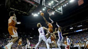 No. 7 Texas rolls past No. 3 Kansas 76-56 for Big 12 title