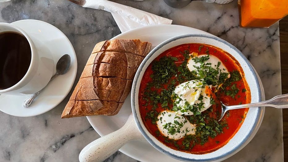 baked eggs, pastry and coffee