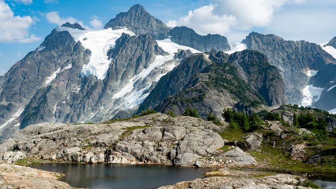 Glacial tarn and glaciated crags of Mount Shuksan, Washington. Mt. Shuksan lies within North Cascades National Park. (Photo by: Marli Miller/UCG/Universal Images Group via Getty Images)