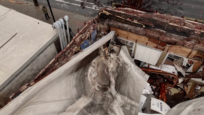 Video recorded in Atlanta shows a roof collapse at the city's iconic Mary Macs Tea Room after heavy rain and flooding moved through the region on Wednesday.