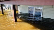 Minnesota homeowner describes ‘punch to the gut' seeing floodwater rushing in