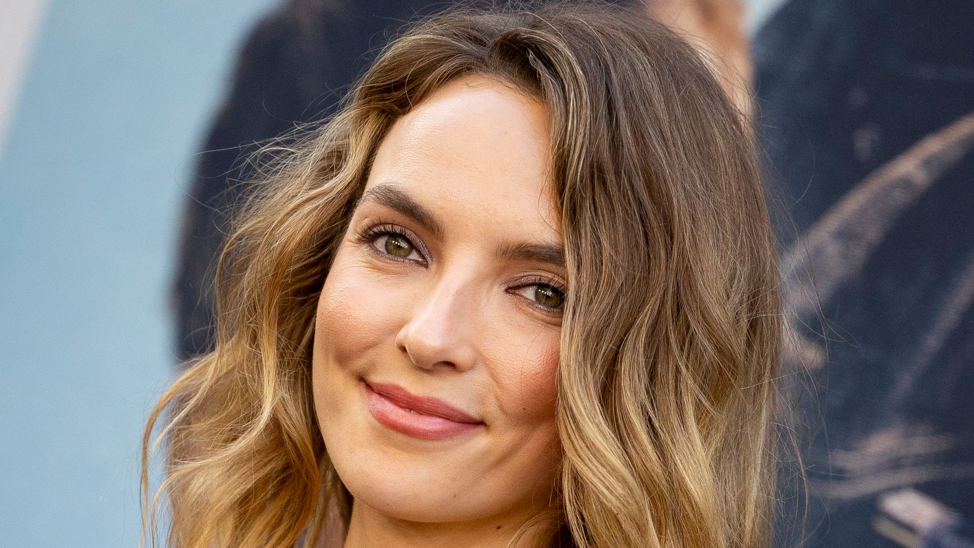 jodie comer smiling on red carpet