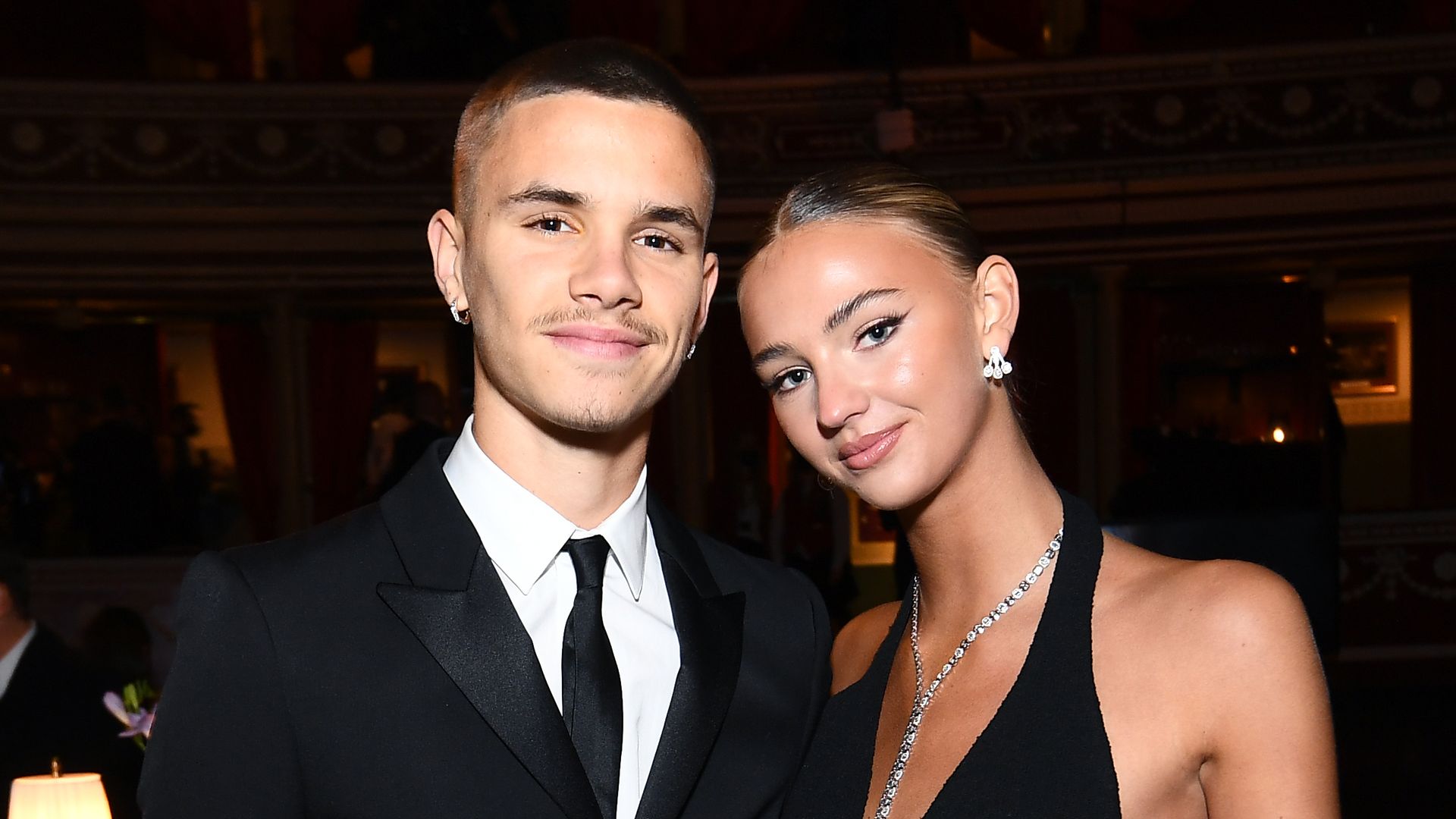 Romeo Beckham and Mia Regan attend The Fashion Awards 2021 at the Royal Albert Hall