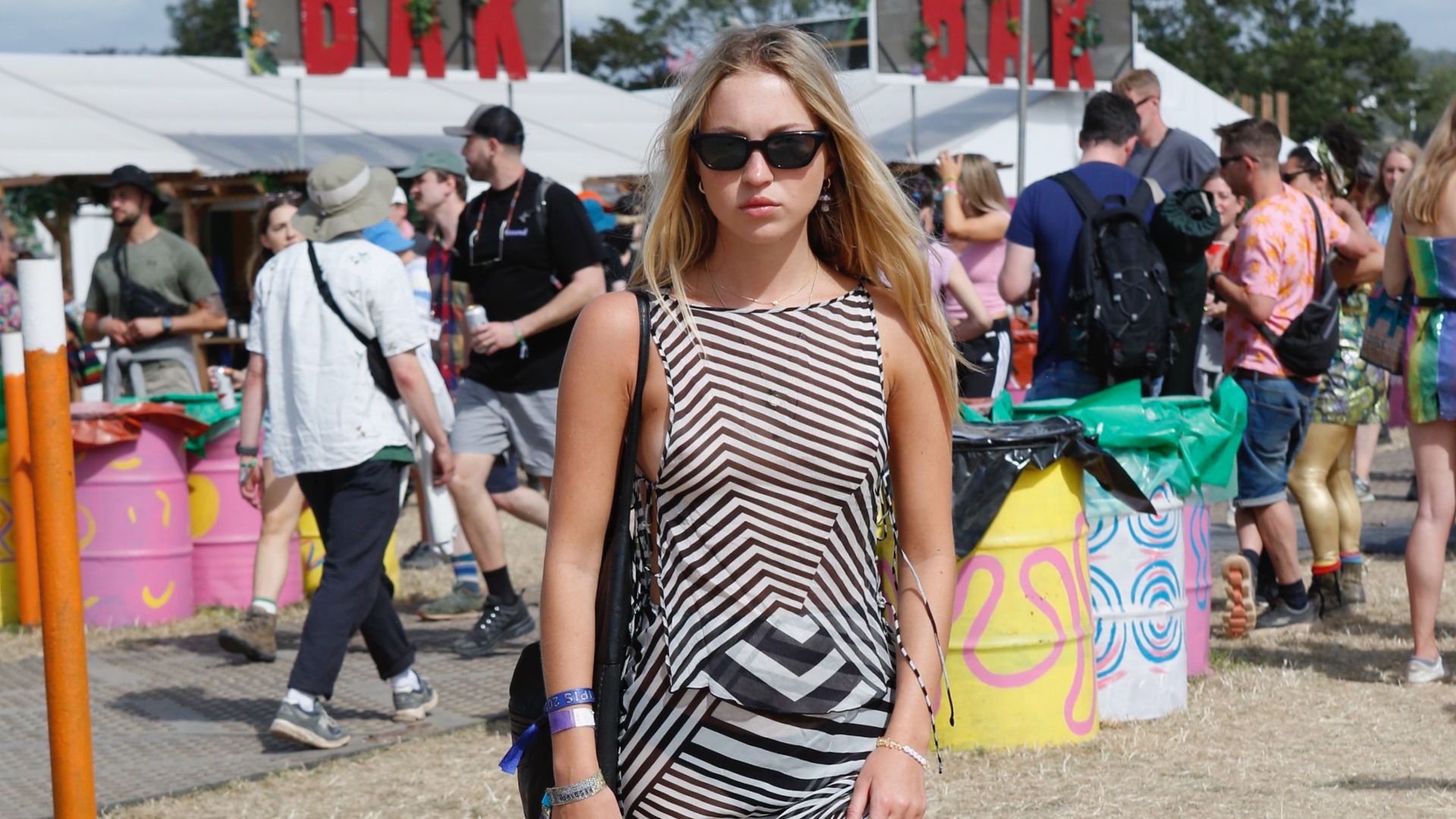 Lila Moss cosplays Kate Moss in sheer outfit at Glastonbury