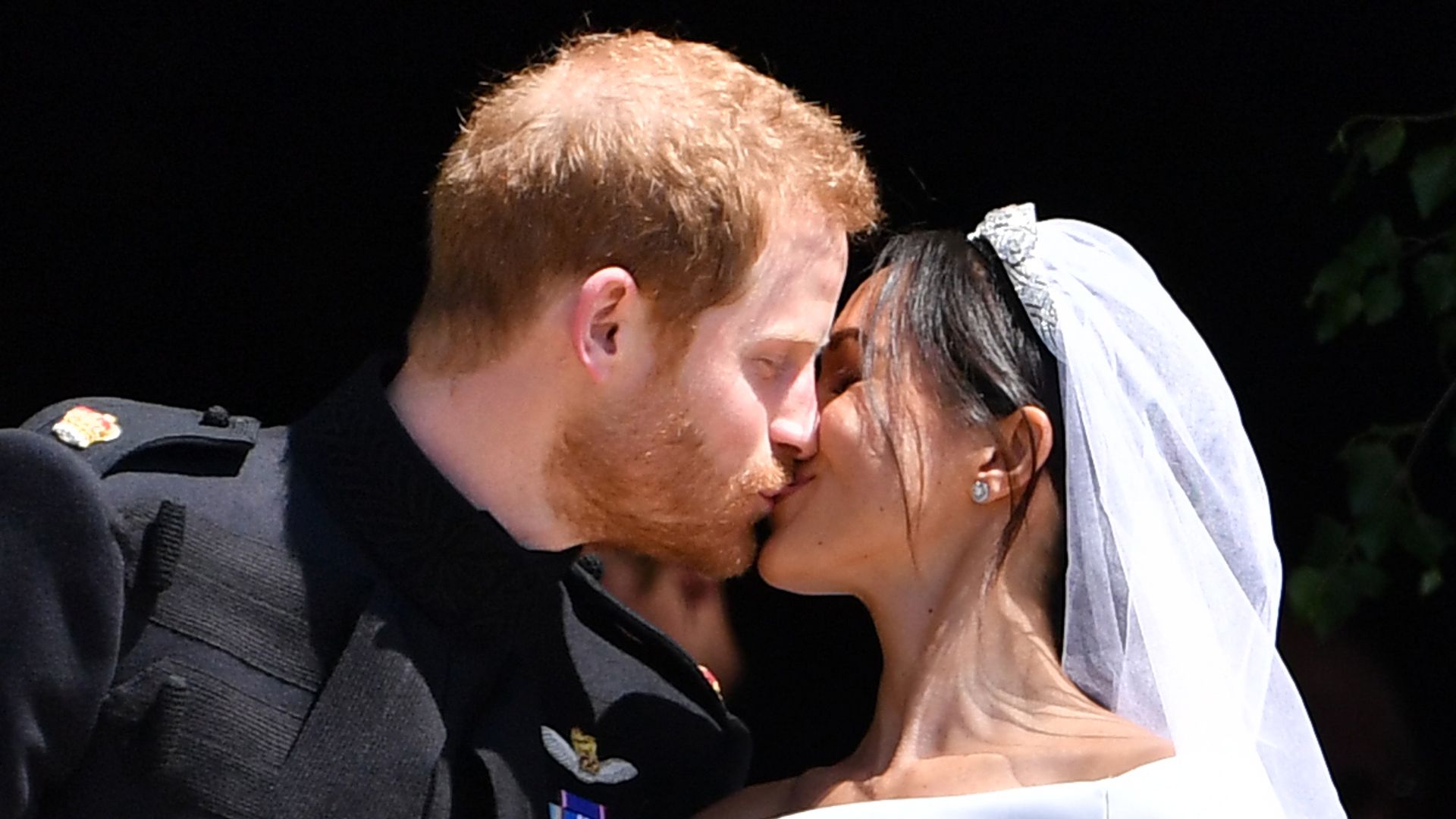 Harry and Meghan kiss on wedding day