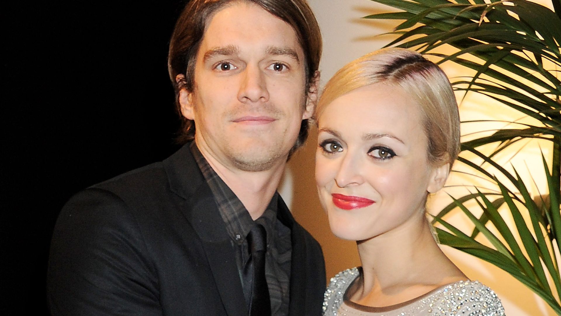 Fearne Cotton in a silver dress with her husband Jesse Wood