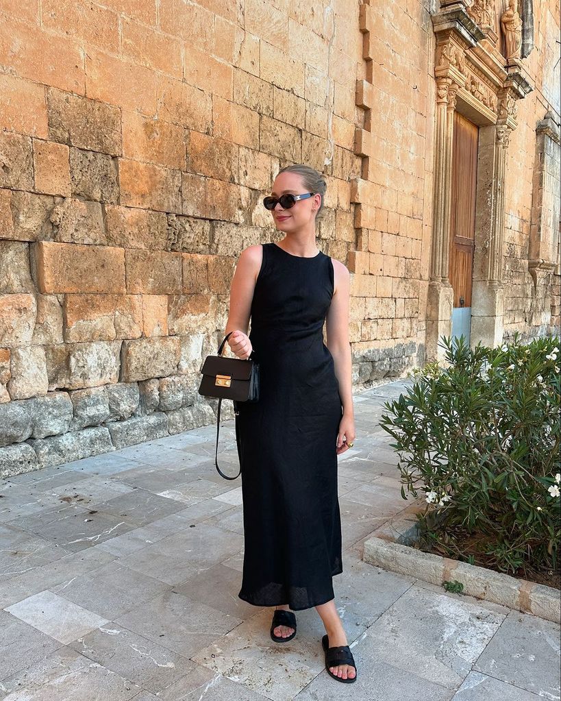 MIrthe MJ wearing black summer dress