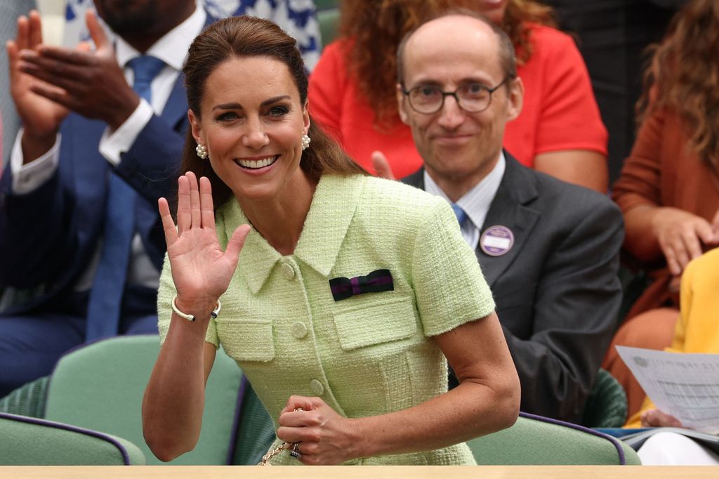 Kate Middleton waving from royal box at Wimbledon