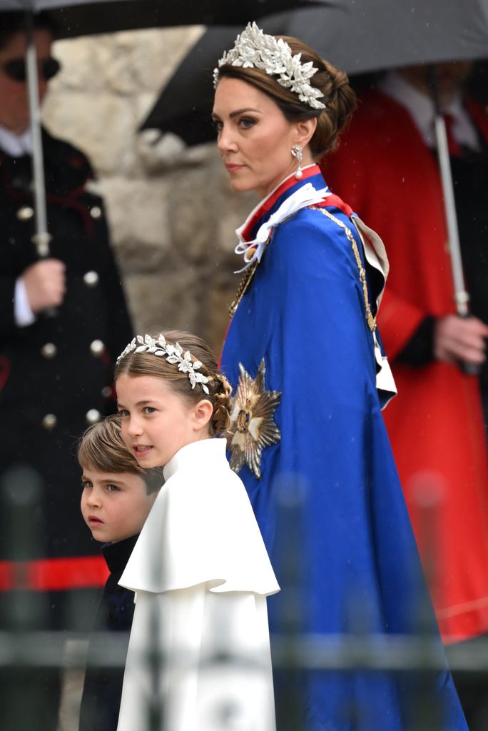 Princess Kate and Princess Charlotte in floral headdresses for the Coronation of King Charles III and Queen Camilla