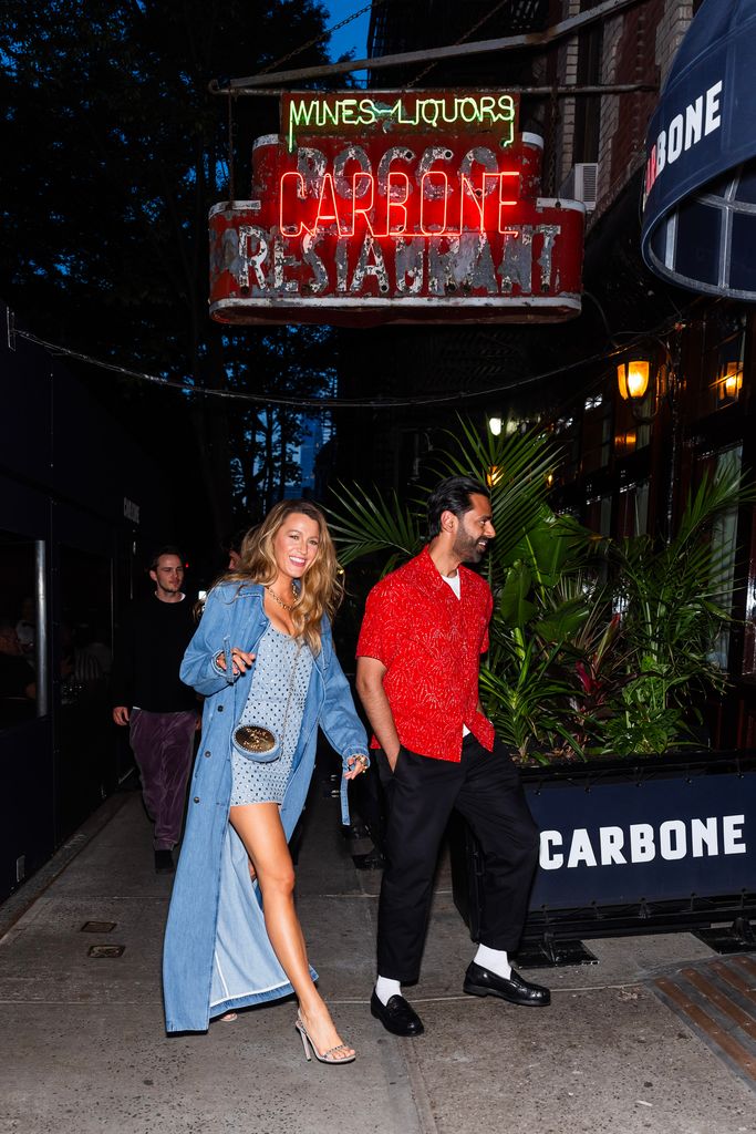 Blake lively walking in a leg-extending mini dress