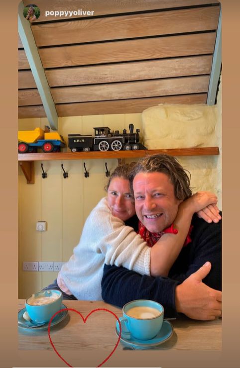 Jools Oliver embracing husband Jamie