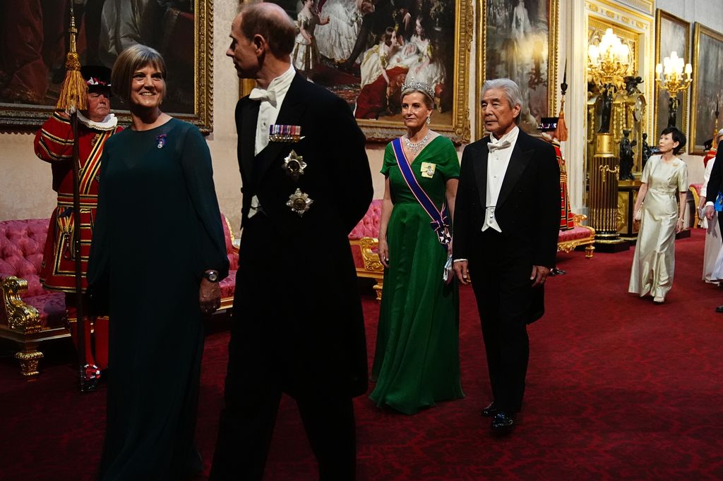 Ms Julia Longbottom (L), Prince Edward, Duke of Edinburgh, Sophie, Duchess of Edinburgh and H.E. Mr. Hirofumi Nakasone (R) make their way along the East Gallery 