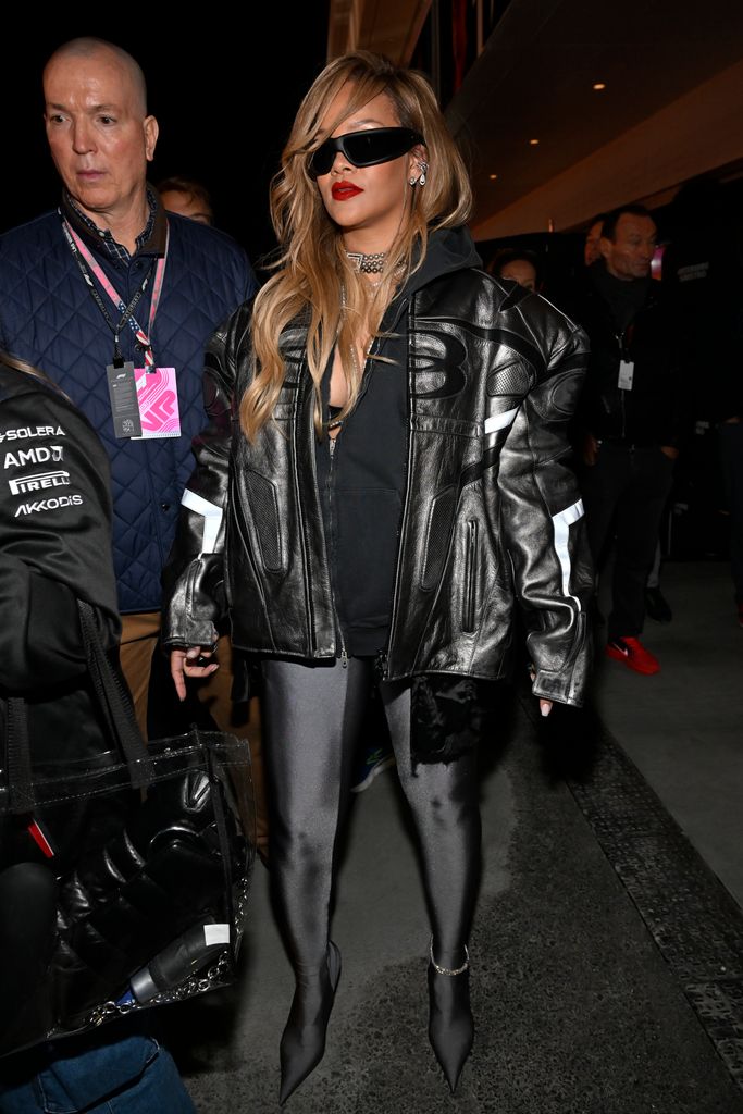 rihanna in leather biker jacket at formula one 